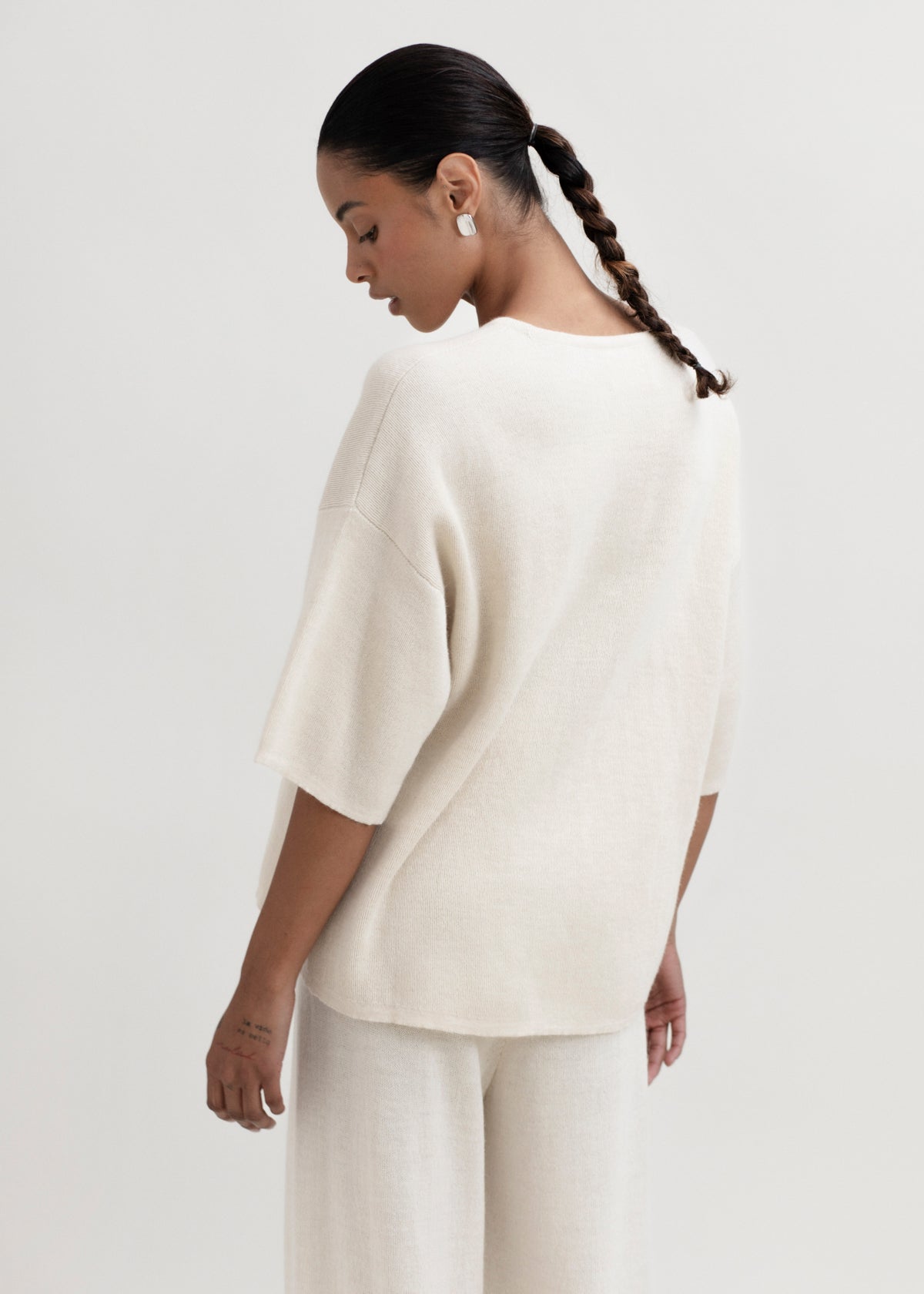 Solace Tee Sweater in Cream, alpaca tee sweater by Ahblo, worn by model