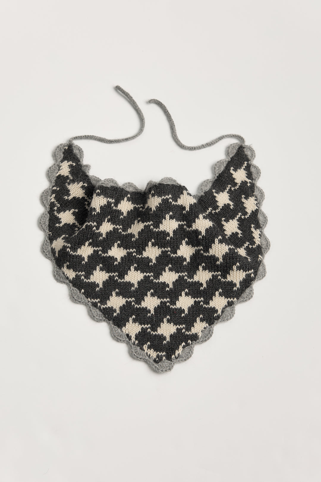 Tessa Scarf in Grey, reversible houndstooth baby alpaca triangle scarf by Ahblo, flat lay