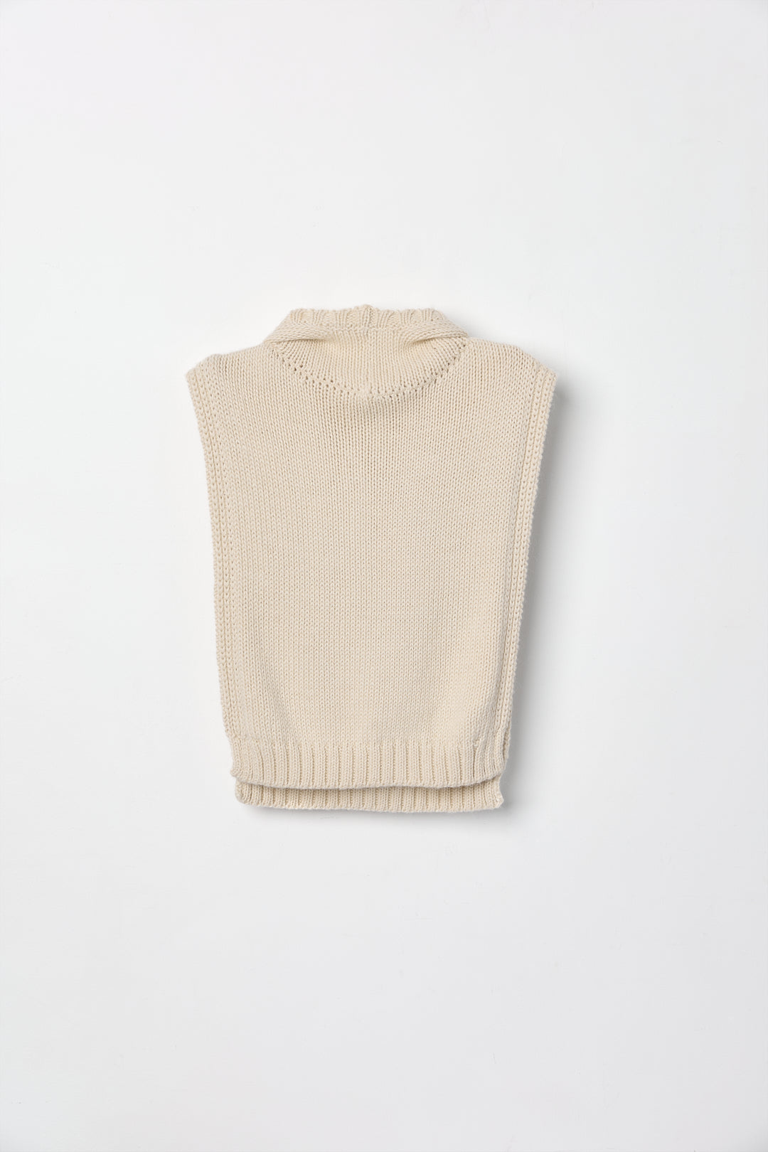 Tofino Poncho in Cream, baby alpaca mini poncho by Ahblo, flat lay