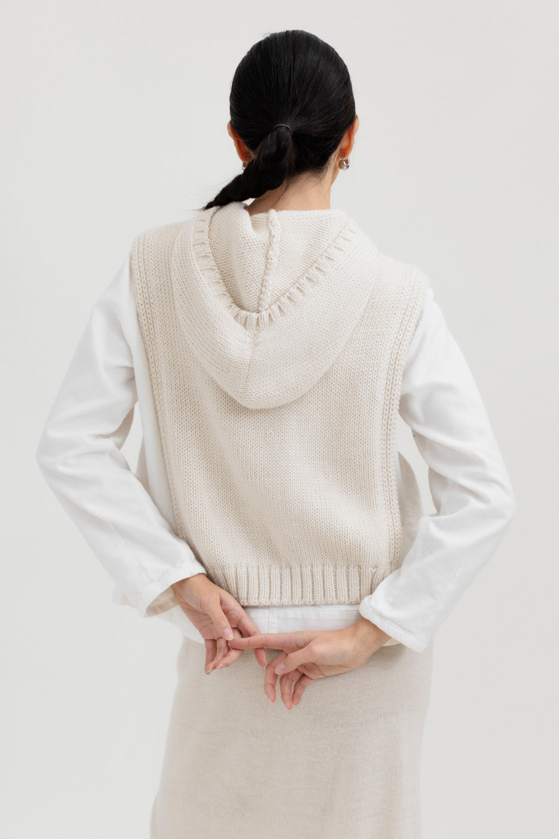 Tofino Poncho in Cream, baby alpaca mini poncho by Ahblo, worn by model