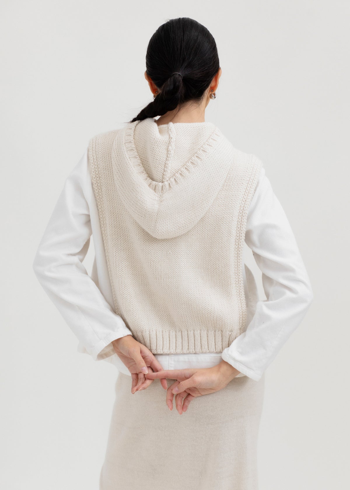 Tofino Poncho in Cream, baby alpaca mini poncho by Ahblo, worn by model