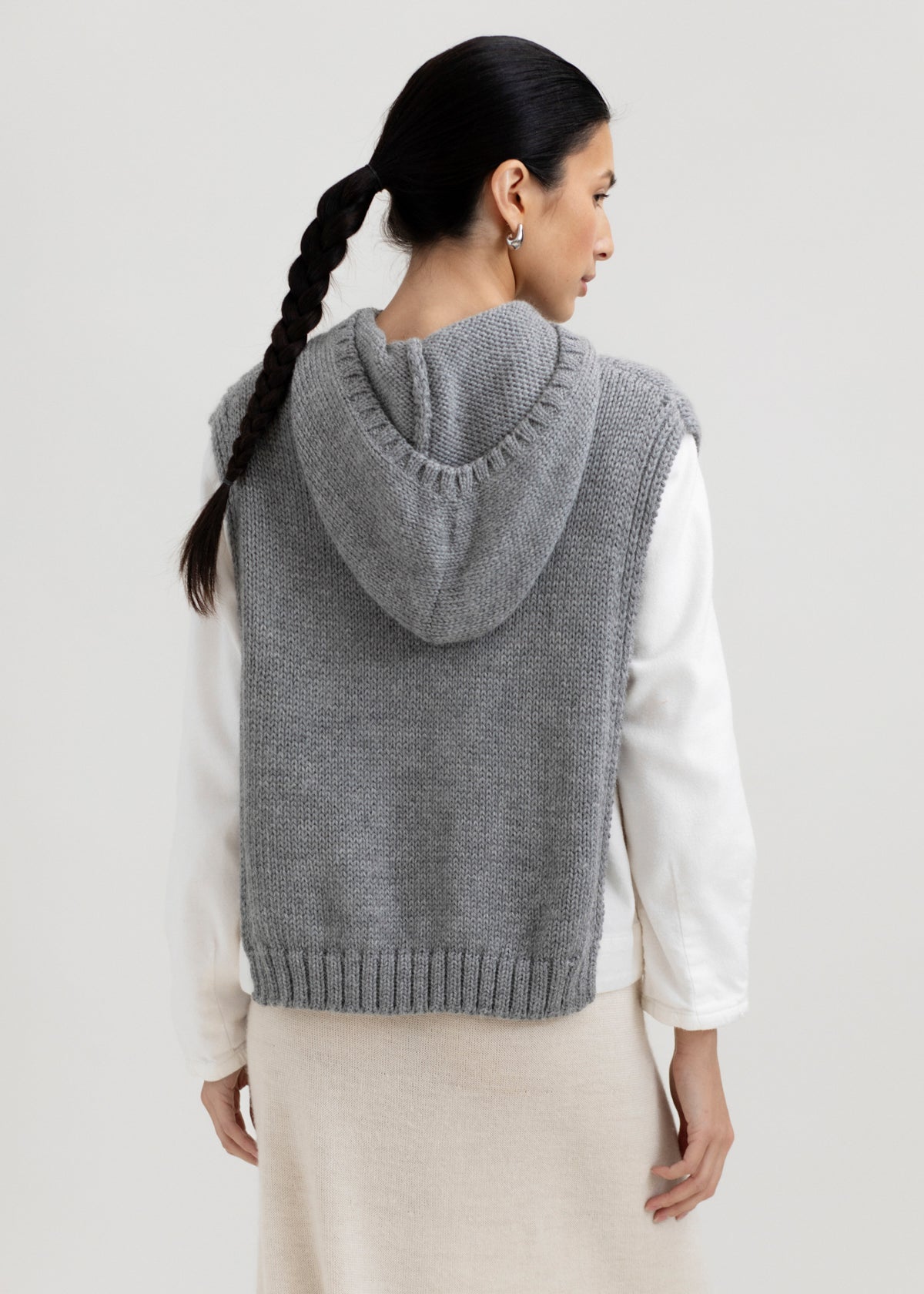 Tofino Poncho in Mist Grey, baby alpaca mini poncho by Ahblo, worn by model