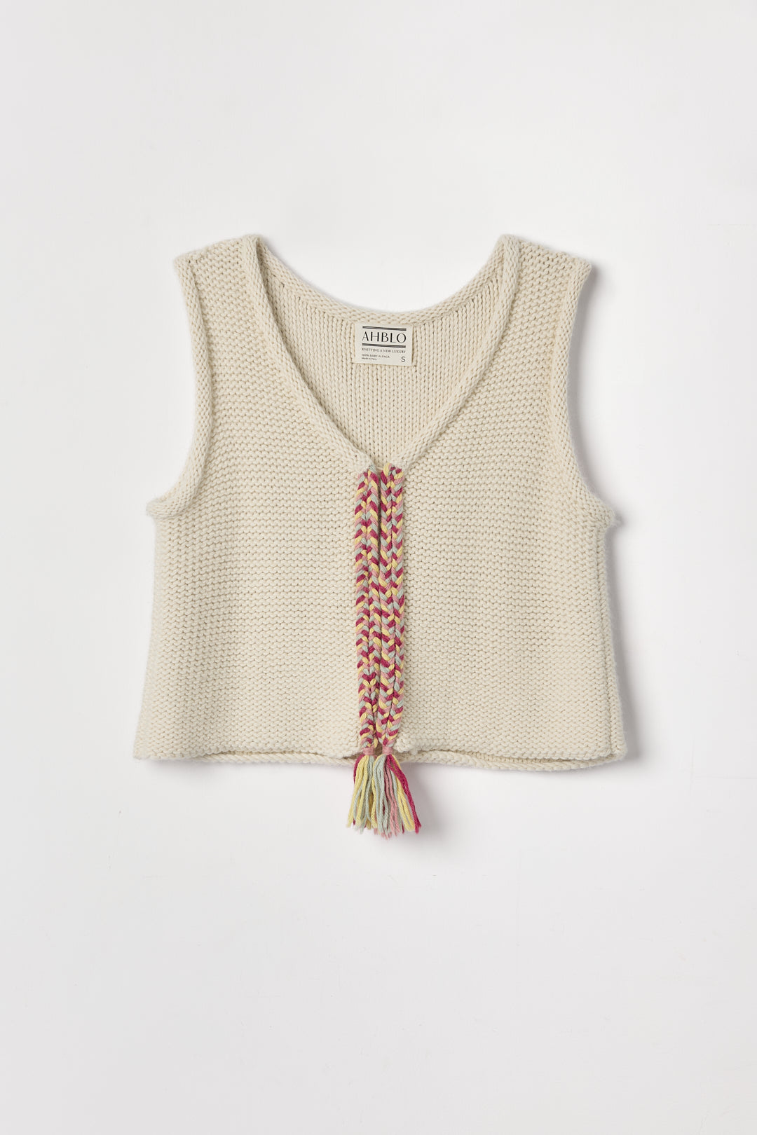 Vela Braid Vest in Cream, baby alpaca knit vest with hand-braided trim by Ahblo, flat lay