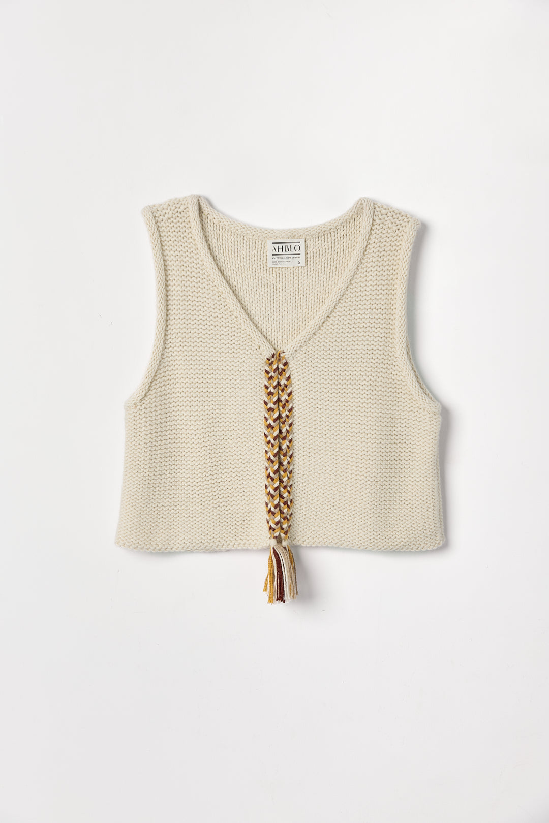 Vela Braid Vest in Ivory, baby alpaca knit vest with hand-braided trim by Ahblo, flat lay