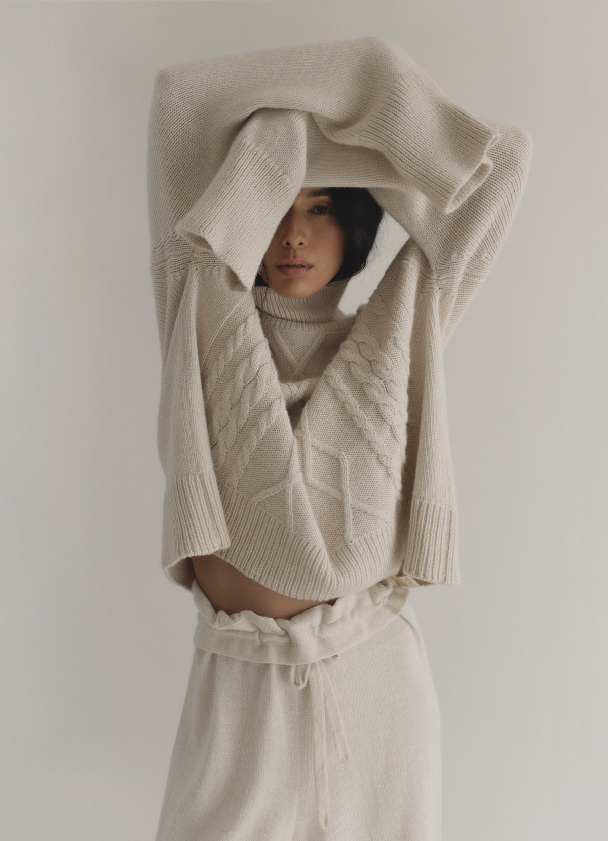 Sierra clable sweater cream on model 